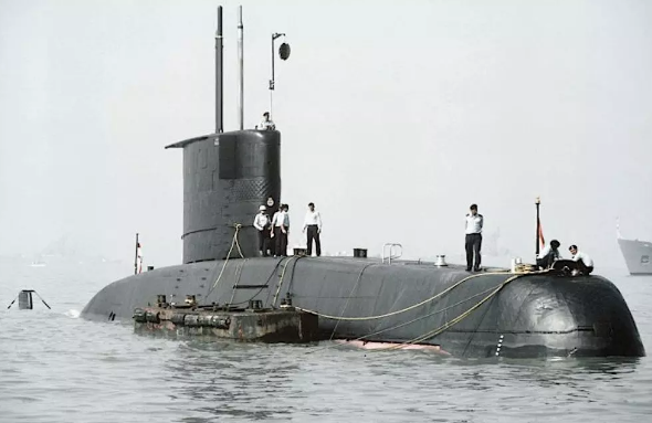 Memakai Type 209